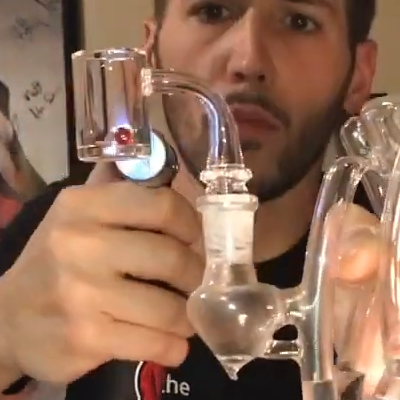 How To Take A Dab: Bucket Style Quartz Banger Getting Heated By Torch Image